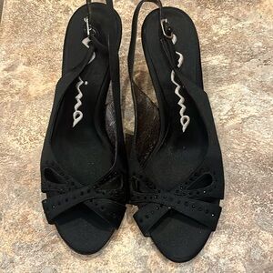 Nina Black heel with buckle strap around heel. Black bling on from top